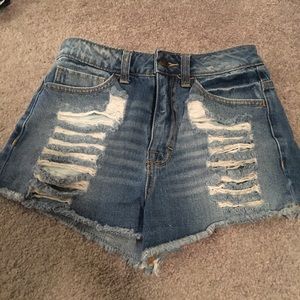 Blue ripped jean shorts